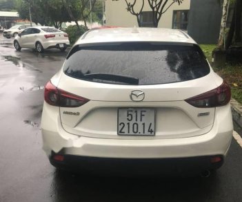 Mazda 3   1.5AT  2015 - Cần bán gấp Mazda 3 1.5AT năm 2015, màu trắng số tự động, giá chỉ 615 triệu