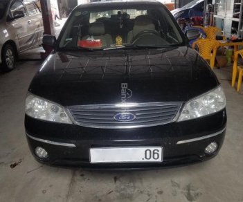 Ford Laser 2004 - Cần bán Ford Laser năm 2004, số tự động, màu đen, xe nhập