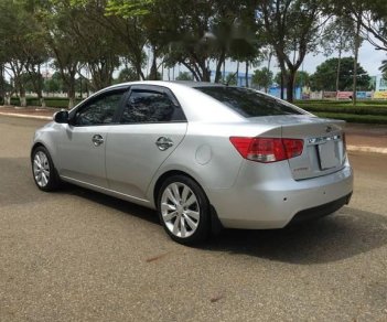 Kia Forte   2010 - Bán ô tô Kia Forte sản xuất năm 2010, màu bạc xe gia đình