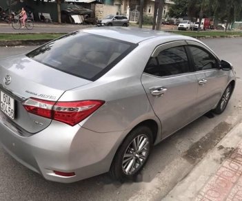 Toyota Corolla altis   2016 - Cần bán gấp Toyota Corolla altis sản xuất 2016, màu bạc