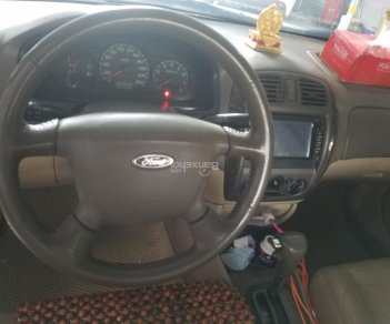 Ford Laser 2004 - Cần bán Ford Laser năm 2004, số tự động, màu đen, xe nhập