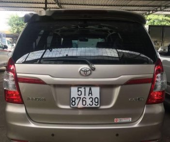 Toyota Innova E  2014 - Bán Toyota Innova E năm sản xuất 2014 như mới, giá chỉ 590 triệu