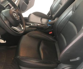 Mazda 3   1.5AT  2015 - Cần bán gấp Mazda 3 1.5AT năm 2015, màu trắng số tự động, giá chỉ 615 triệu
