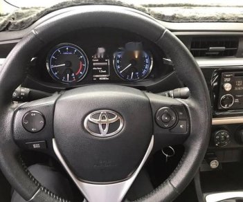 Toyota Corolla altis   2016 - Cần bán gấp Toyota Corolla altis sản xuất 2016, màu bạc