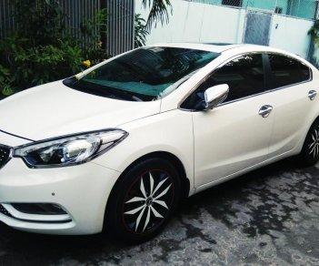 Kia K3 AT 2015 - Gia đình cần bán xe Kia K3 2015 màu trắng