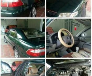 Mazda 626   2003 - Cần bán lại xe Mazda 626 năm sản xuất 2003, màu xanh lục chính chủ, giá chỉ 165 triệu