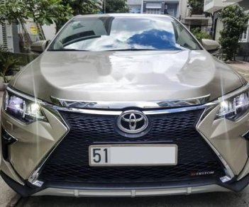 Toyota Camry   2016 - Cần bán gấp Toyota Camry sản xuất năm 2016, màu vàng còn mới giá cạnh tranh