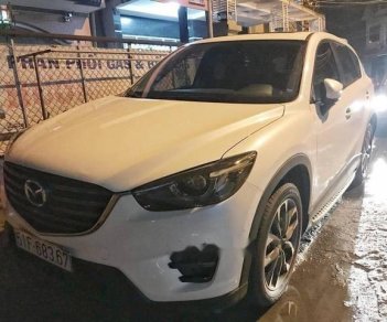 Mazda CX 5 2.0 2016 - Bán xe Mazda CX 5 2.0 đời 2016, màu trắng còn mới, giá chỉ 815 triệu