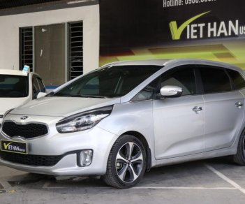 Kia Rondo 2.0AT 2015 - Bán xe Kia Rondo 2.0AT năm 2015, màu bạc, 566 triệu