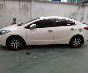 Kia K3 AT 2015 - Gia đình cần bán xe Kia K3 2015 màu trắng