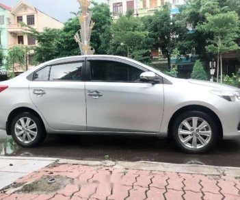 Toyota Vios   2015 - Bán Toyota Vios năm 2015, màu bạc số sàn 