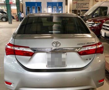 Toyota Corolla altis 1.8MT 2016 - Bán Toyota Corolla Altis 1.8MT sản xuất năm 2016, màu bạc, có trả góp