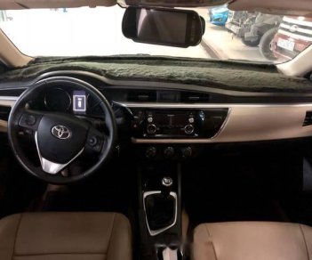 Toyota Corolla altis 1.8G MT 2016 - Cần bán Toyota Corolla altis 1.8G MT 2016, màu bạc số sàn, giá 665tr