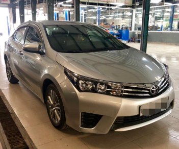 Toyota Corolla altis 1.8MT 2016 - Bán Toyota Corolla Altis 1.8MT sản xuất năm 2016, màu bạc, có trả góp