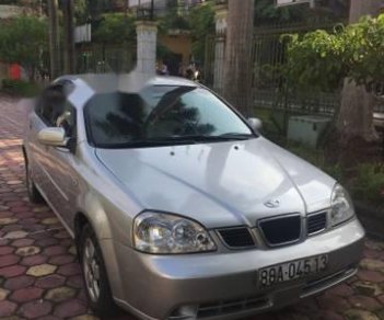 Daewoo Lacetti 2004 - Cần bán lại xe Daewoo Lacetti sản xuất năm 2004, màu bạc chính chủ