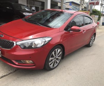 Kia K3 2.0 AT 2014 - Cần bán Kia K3 năm sản xuất 2014, màu đỏ, tự động 2.0L