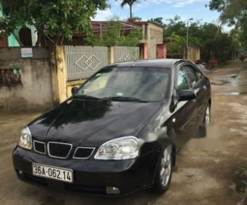 Daewoo Lacetti 2005 - Cần bán xe Daewoo Lacetti 2005, màu đen xe gia đình, giá tốt