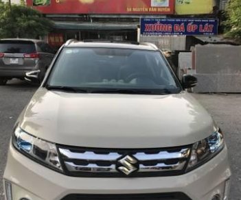 Suzuki Vitara   1.6AT 2016 - Cần bán gấp Suzuki Vitara 1.6AT sản xuất 2016, màu kem (be)  