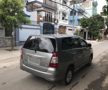 Toyota Innova G 2014 - Mình bán Toyota Innova G 2014 số tự động, màu bạc, xe đẹp, zin nguyên