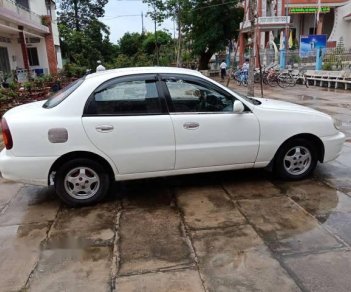 Daewoo Lanos   2003 - Cần bán Daewoo Lanos đời 2003, màu trắng xe gia đình, giá chỉ 98 triệu