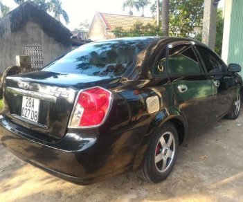 Daewoo Lacetti 2004 - Cần bán xe Daewoo Lacetti đời 2004, màu đen