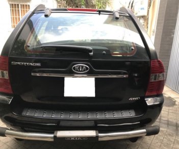 Kia Sportage MT 2006 - Cần bán xe gấp Sportage MT 2006, máy dầu, màu đen nhập Korea