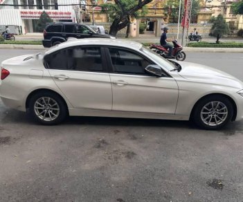 BMW 3 Series 320i 2012 - Bán BMW 320i sản xuất 2012, màu trắng, xe nhập