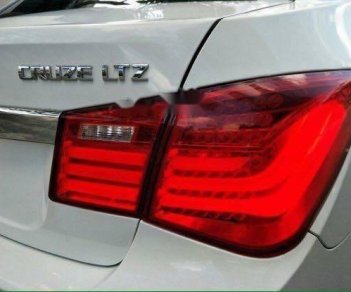 Chevrolet Cruze 1.8LTZ 2014 - Cần bán lại xe Chevrolet Cruze 1.8LTZ sản xuất năm 2014, màu trắng