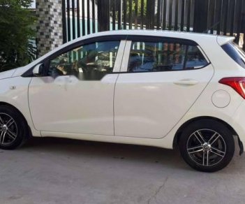 Hyundai Grand i10 2014 - Cần bán lại xe Hyundai Grand i10 sản xuất 2014, màu trắng, biển số Bình Dương