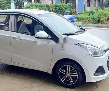 Hyundai Grand i10 2014 - Cần bán lại xe Hyundai Grand i10 sản xuất 2014, màu trắng, biển số Bình Dương