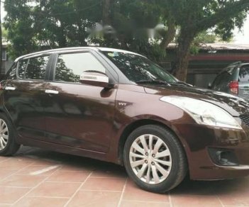 Suzuki Swift 2014 - Bán Suzuki Swift đời 2014, màu nâu, 430tr