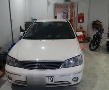 Ford Laser 2004 - Bán ô tô Ford Laser sản xuất năm 2004, màu trắng xe gia đình