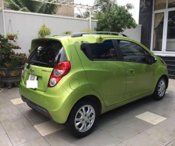 Chevrolet Spark  LTZ 2014 - Bán ô tô Chevrolet Spark LTZ năm sản xuất 2014, màu xanh lục chính chủ