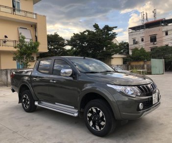 Mitsubishi Triton 2018 - Bán Mitsubishi Triton Mivec 2 cầu số tự động, đời 2018, full options, xe vip giá cực tốt. LH: 0905.91.01.99