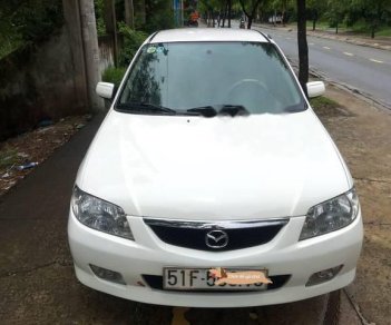 Mazda 323 2002 - Bán Mazda 323 đời 2002, màu trắng ít sử dụng