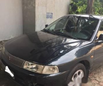 Mitsubishi Lancer 2002 - Cần bán Mitsubishi Lancer sản xuất 2002, màu đen ít sử dụng, giá tốt