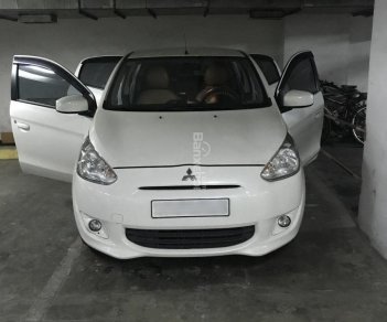 Mitsubishi Mirage 2013 - Bán Mitsubishi Mirage tự động đk 2014, đời 2013, màu trắng, dán phim cách nhiệt Vcool, bả ceramic