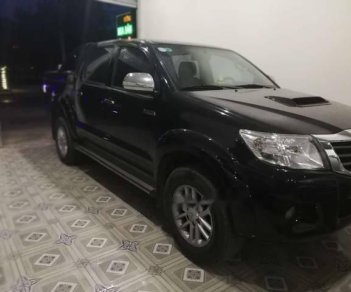 Toyota Hilux  2.5E 2014 - Bán ô tô Toyota Hilux 2.5E năm sản xuất 2014, màu đen, xe nhập Thái Lan