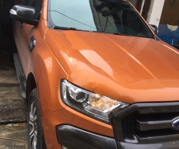 Ford Ranger Wildtrak 3.2L 4x4 AT 2016 - Bán xe Ford Ranger Wildtrak 3.2L 4x4 AT đời 2016, màu vàng, nhập khẩu  