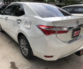 Toyota Corolla altis 1.8AT 2015 - Bán Altis 1.8 số tự động 2015, màu trắng