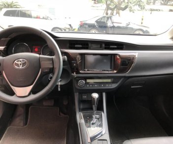 Toyota Corolla altis 1.8AT 2015 - Bán Altis 1.8 số tự động 2015, màu trắng