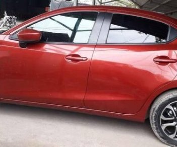 Mazda 2 2016 - Bán xe Mazda 2 đời 2016, màu đỏ còn mới  