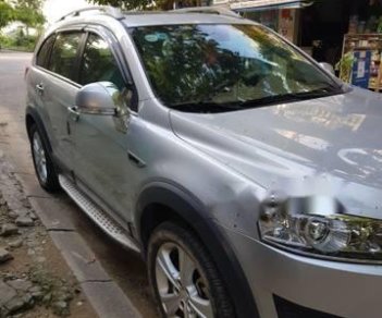 Chevrolet Captiva   2013 - Cần bán xe Chevrolet Captiva đời 2013, màu bạc còn mới, giá chỉ 520 triệu