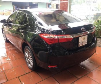 Toyota Corolla altis 1.8G 2015 - Cần bán gấp Toyota Corolla altis 1.8G năm sản xuất 2015, màu đen 