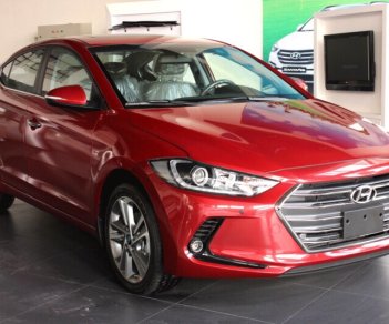 Hyundai Elantra 1.6 MT 2018 - Hyundai Elantra 1.6 MT màu đỏ, xe có sẵn, giao ngay, hỗ trợ vay trả góp đến 90% lãi suất cực ưu đãi. LH: 0903 175 312