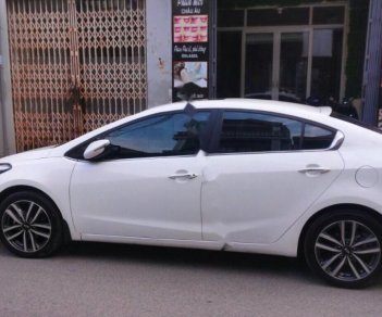 Kia K3 AT 2015 - Bán xe Kia K3 sx 2015, màu trắng số tự động