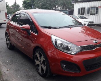 Kia Rio  1.4 AT  2014 - Xe Kia Rio 1.4 AT đời 2014, màu đỏ, nhập khẩu 