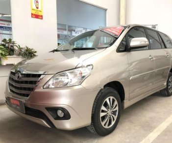 Toyota Innova 2015 - Cần bán lại xe Toyota Innova năm sản xuất 2015, màu nâu 