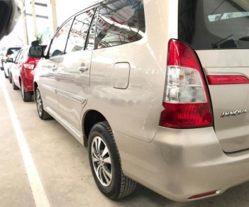 Toyota Innova 2015 - Cần bán lại xe Toyota Innova năm sản xuất 2015, màu nâu 