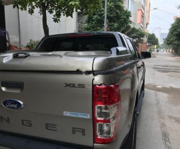 Ford Ranger XLS 2.2L 4x2 AT 2015 - Bán Ford Ranger XLS 2.2L 4x2 AT sản xuất năm 2015, màu vàng cát, nhập khẩu 